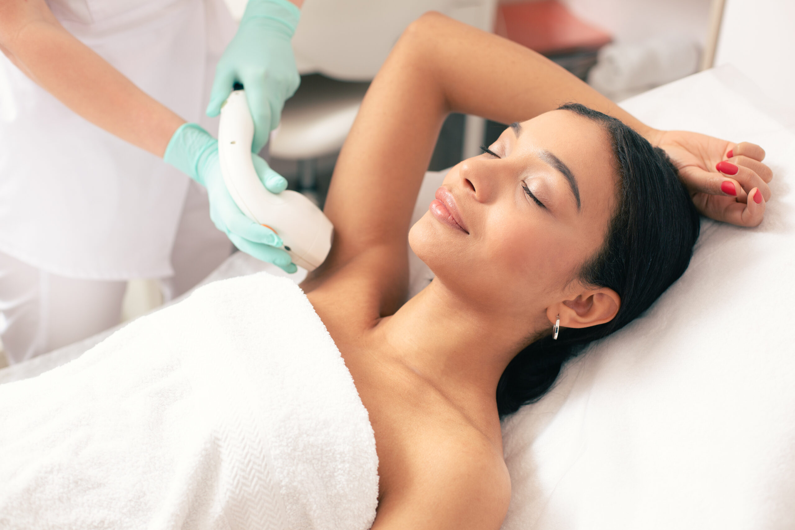 woman getting laser hair removal